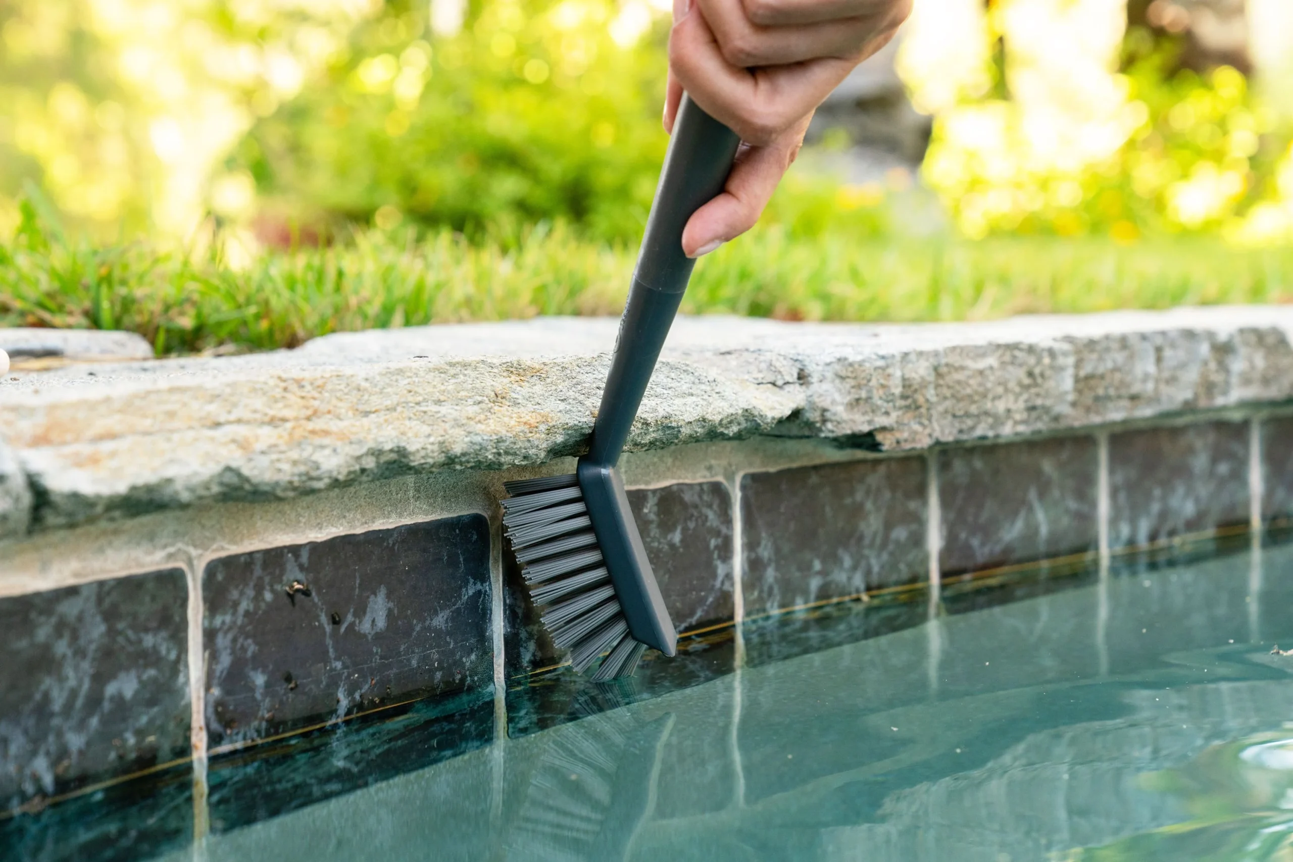 Putting greens clean tile pool | Silver Line Pools